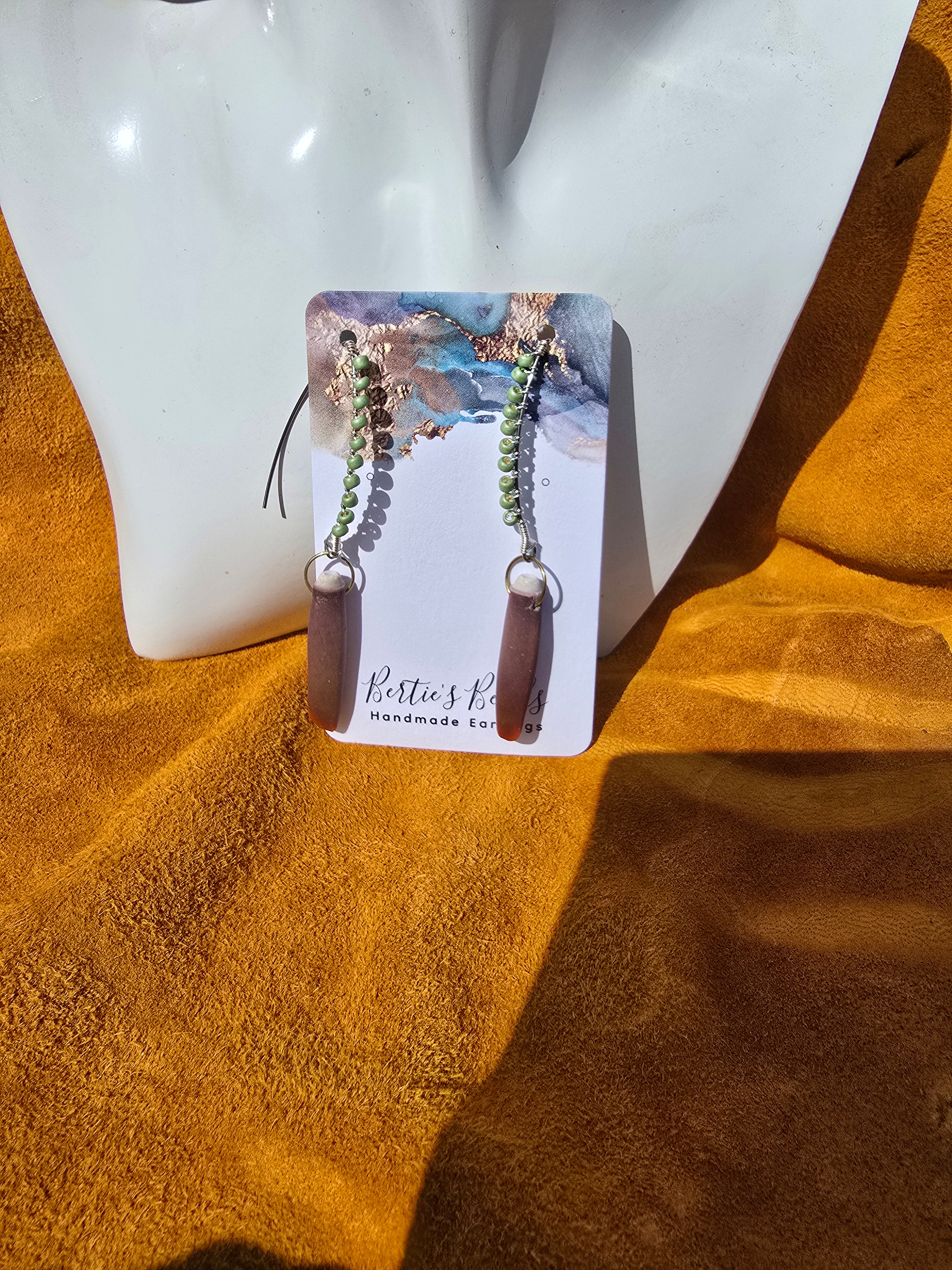 Light green sea urchin earrings