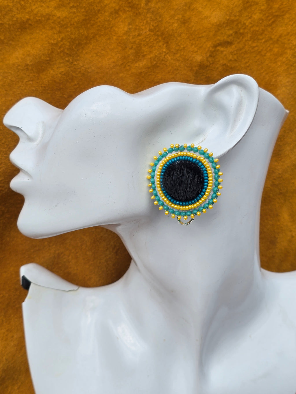 Studded seal fur earrings