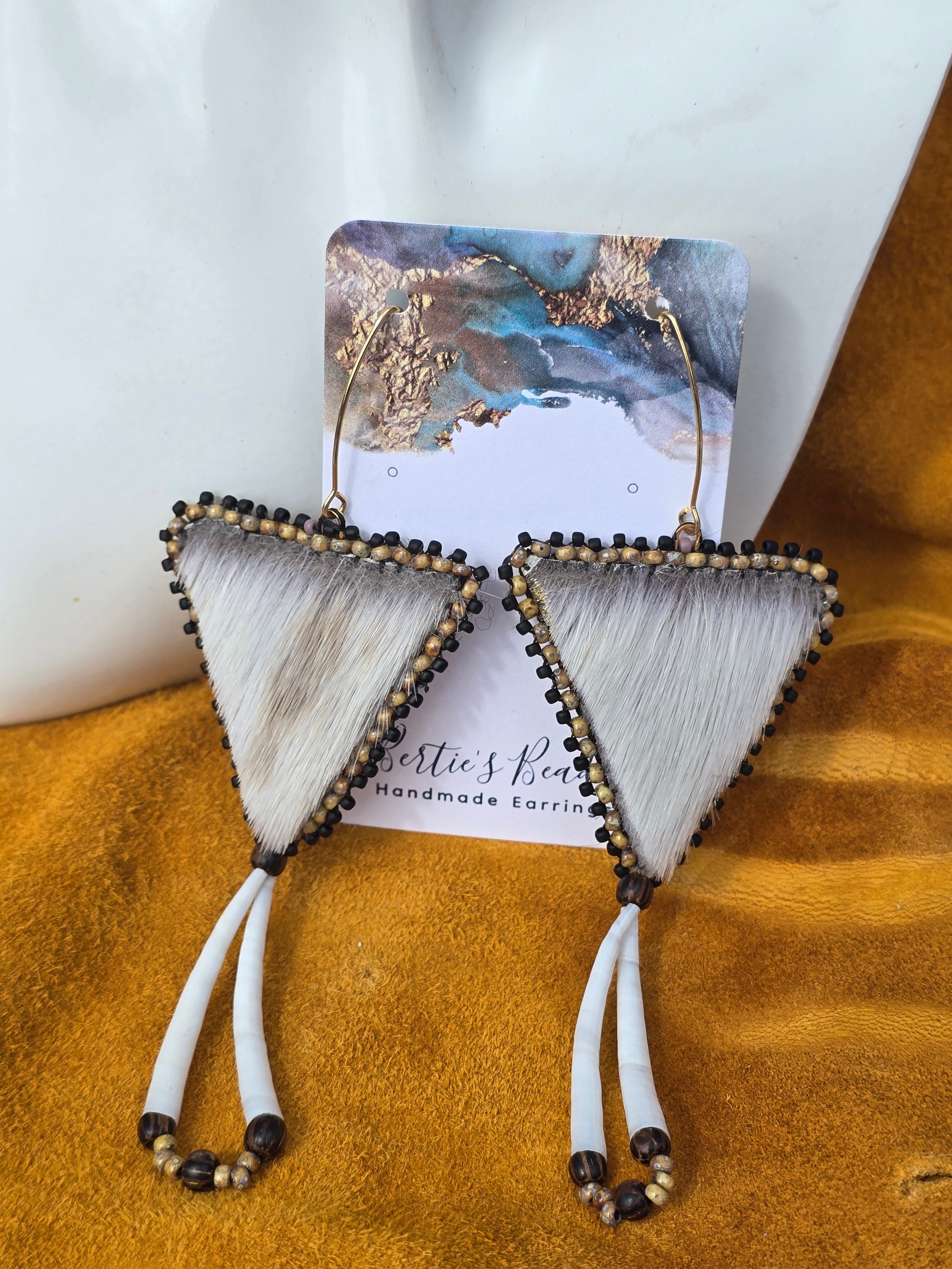 Seal fur and dentallium shells