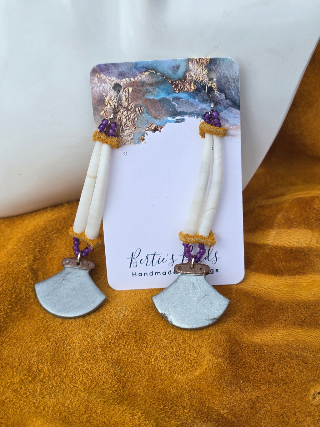 Polymer clay ulluaq earrings with dentalium shell