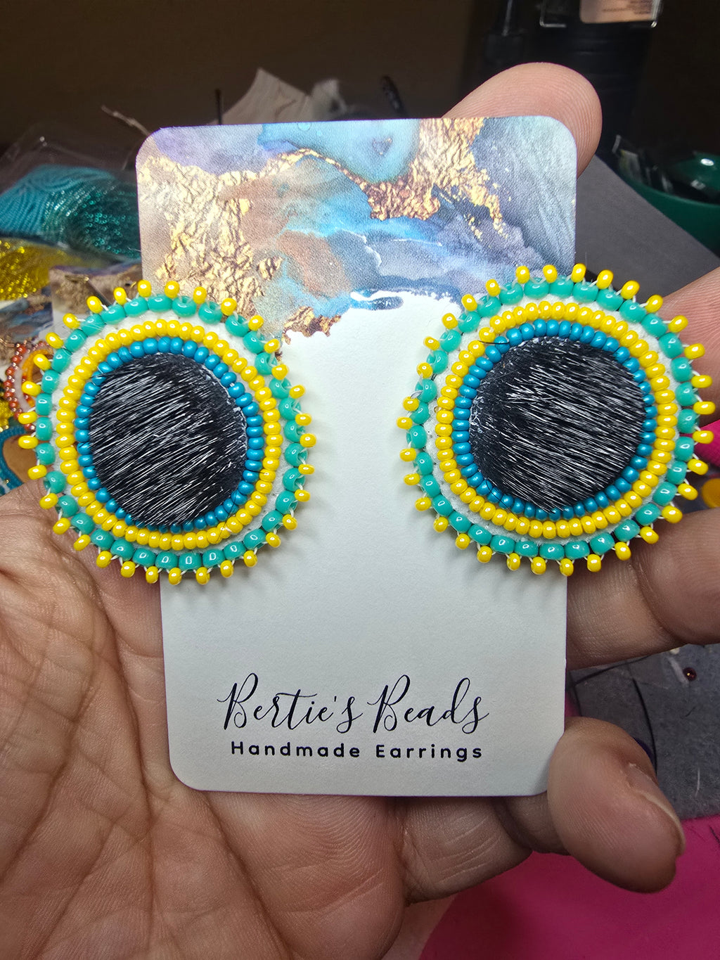 Studded seal fur earrings