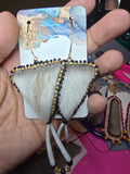 Seal fur and dentallium shells