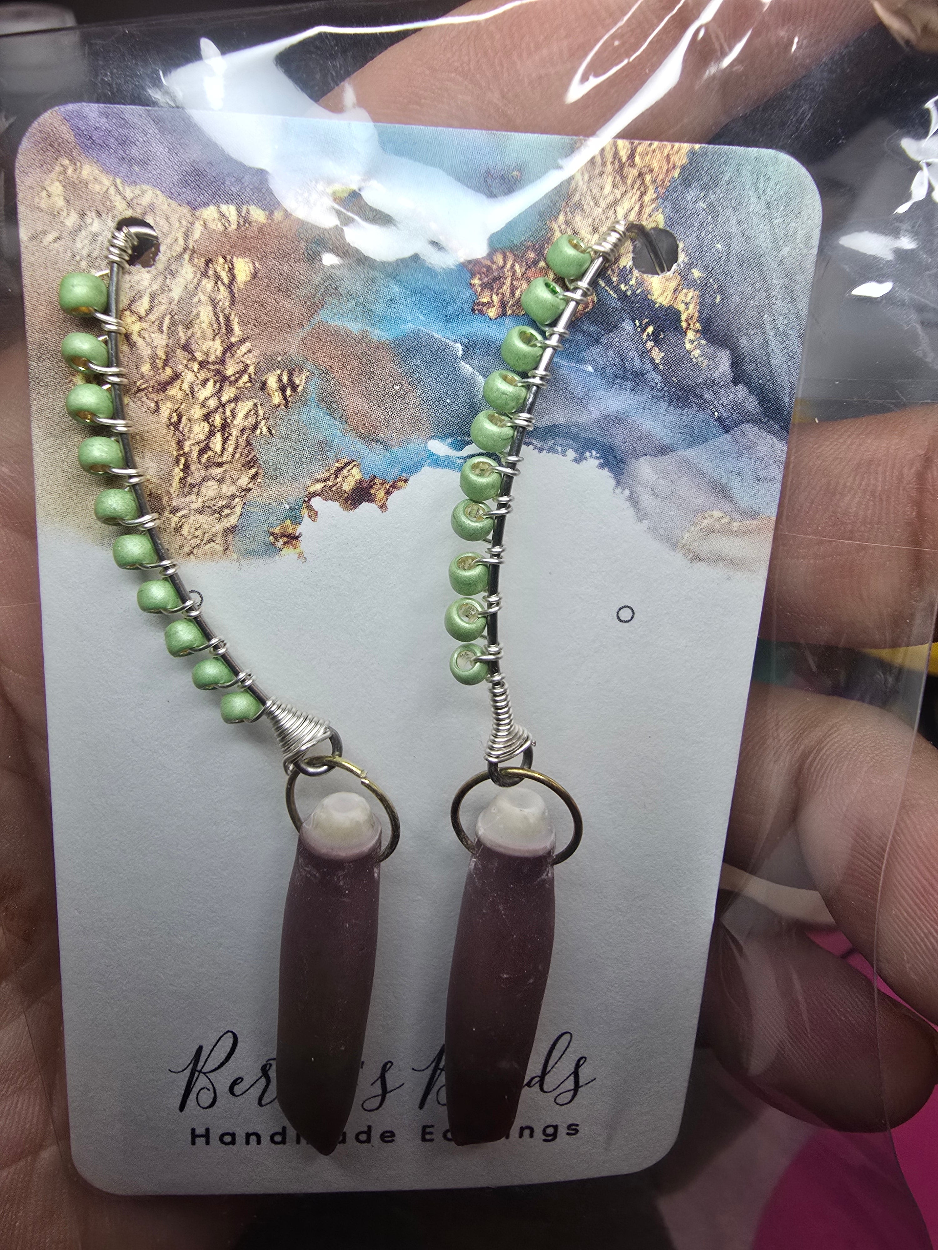 Light green seal urchin earrings